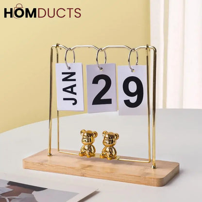 Elegant Gold Metal Flip Desk Calendar with Wooden Base and Bear Figurines – Perpetual Desktop Date Display